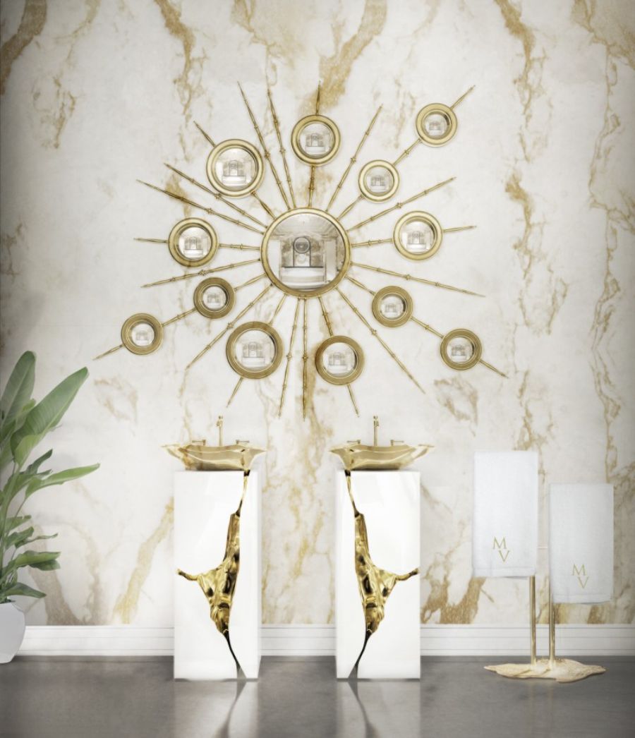 Golden Bathroom, multiple mirror, white and gold freestanfing and golden towel rack.