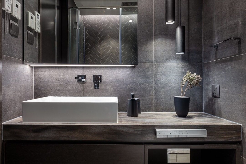 dark tones in the bathroom from Grande Interior Design