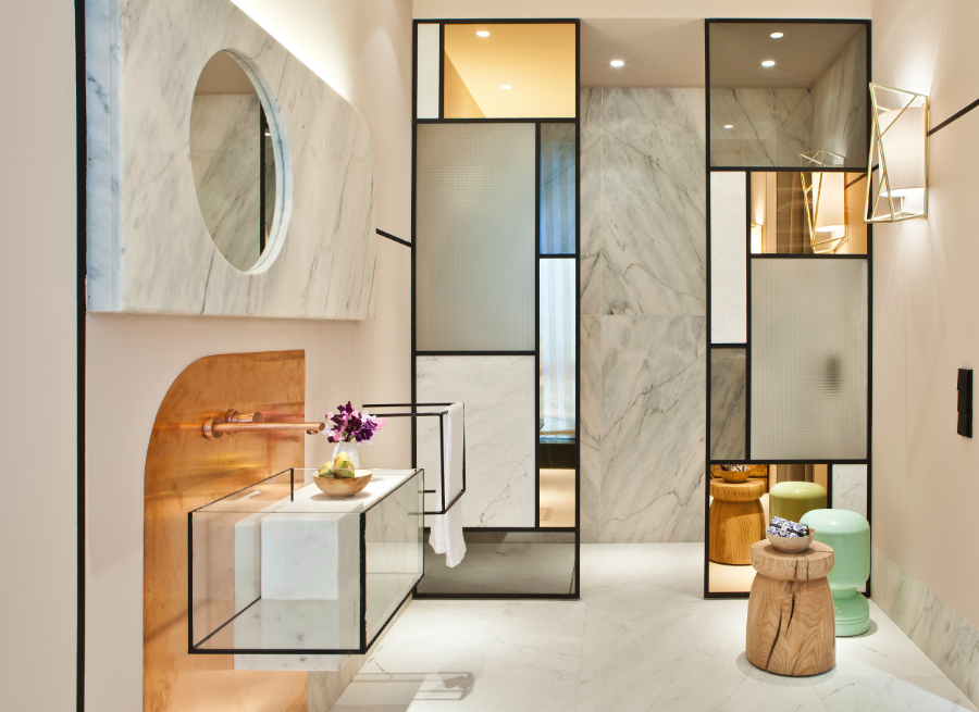 bathroom by Pepe Leal with geometric designs and marble mirror