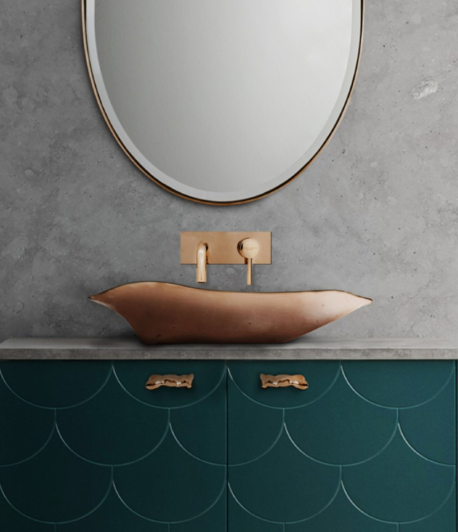 bathroom by maison valentina with golden sink and oval mirror