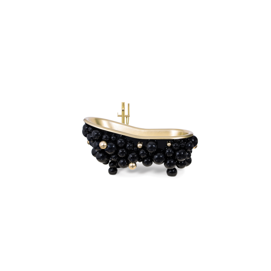 Newton is a notable source of design inspiration. This bathtub is composed of cast iron that has been painted gold to display its complete golden interior, and it has a curved lip style shape, a classic design element that exudes comfort. This sculptural and creative object will complement your new Master Bathroom Design thanks to the high-gloss black and gold lacquered spheres.