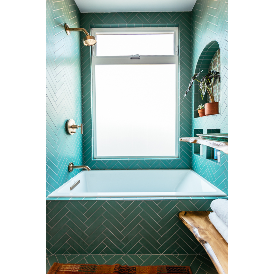 Blue bathroom designed by JUSTINA BLAKENEY