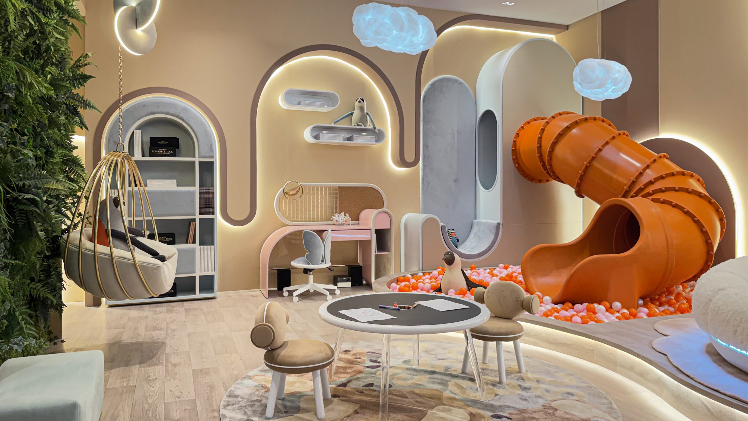Luxury children’s bedroom featuring an orange slide and playful decor by CIRCU at Milan Design Week 2026.