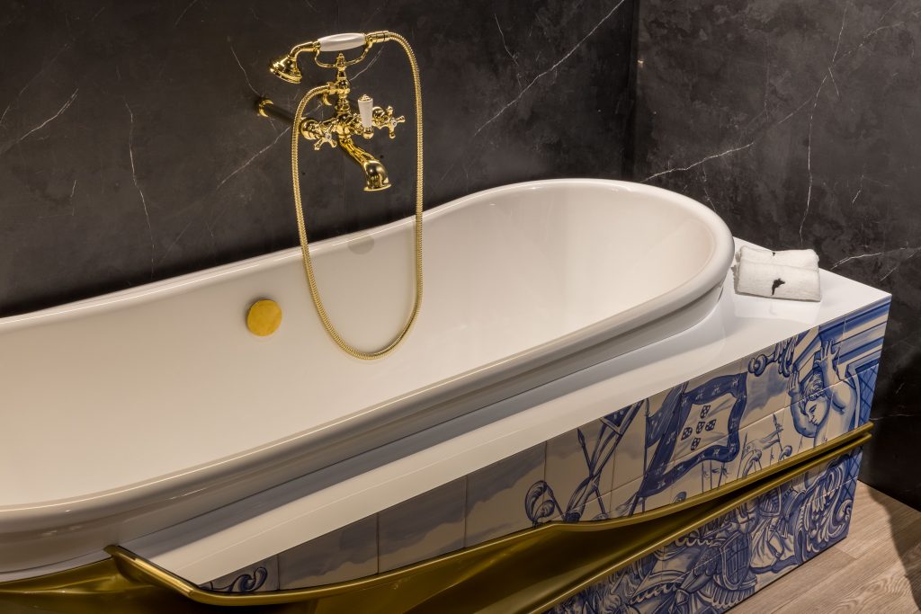 Maison Valentina Heritage Bathtub with hand-painted Portuguese azulejo tiles and gold Victorian faucet