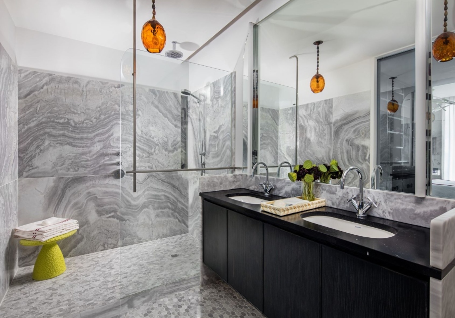 Gray marble bathroom with walk-in shower by Nicole Fuller Interiors - Soho Residence Project
