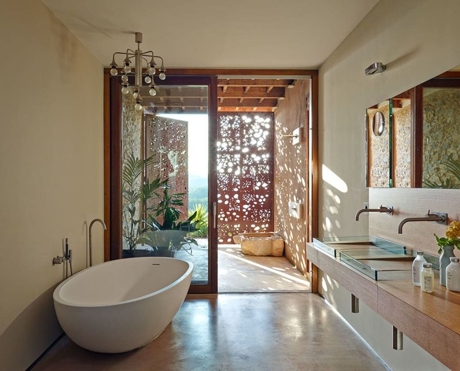 bathroom by zest architecture with white bathtub
