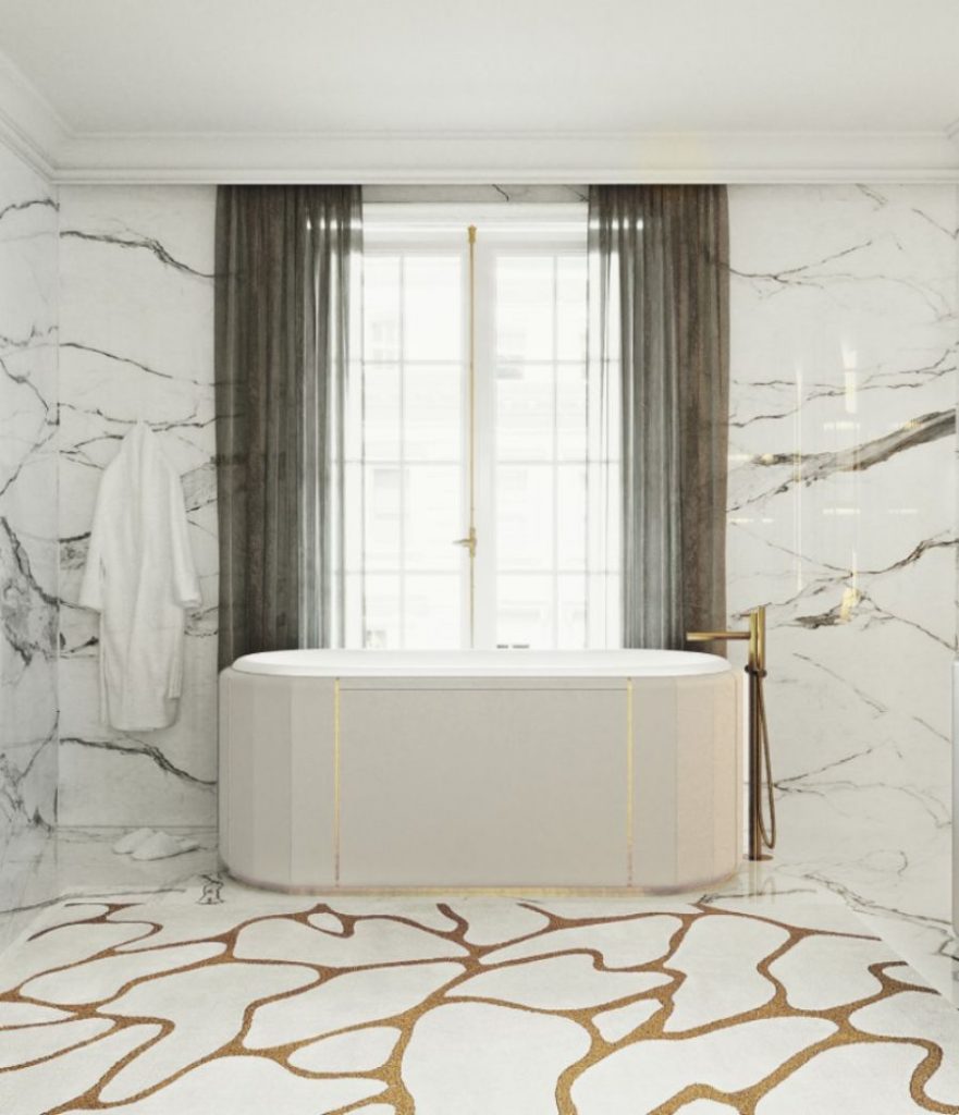 bathroom with white bathtub and white and golden rug
