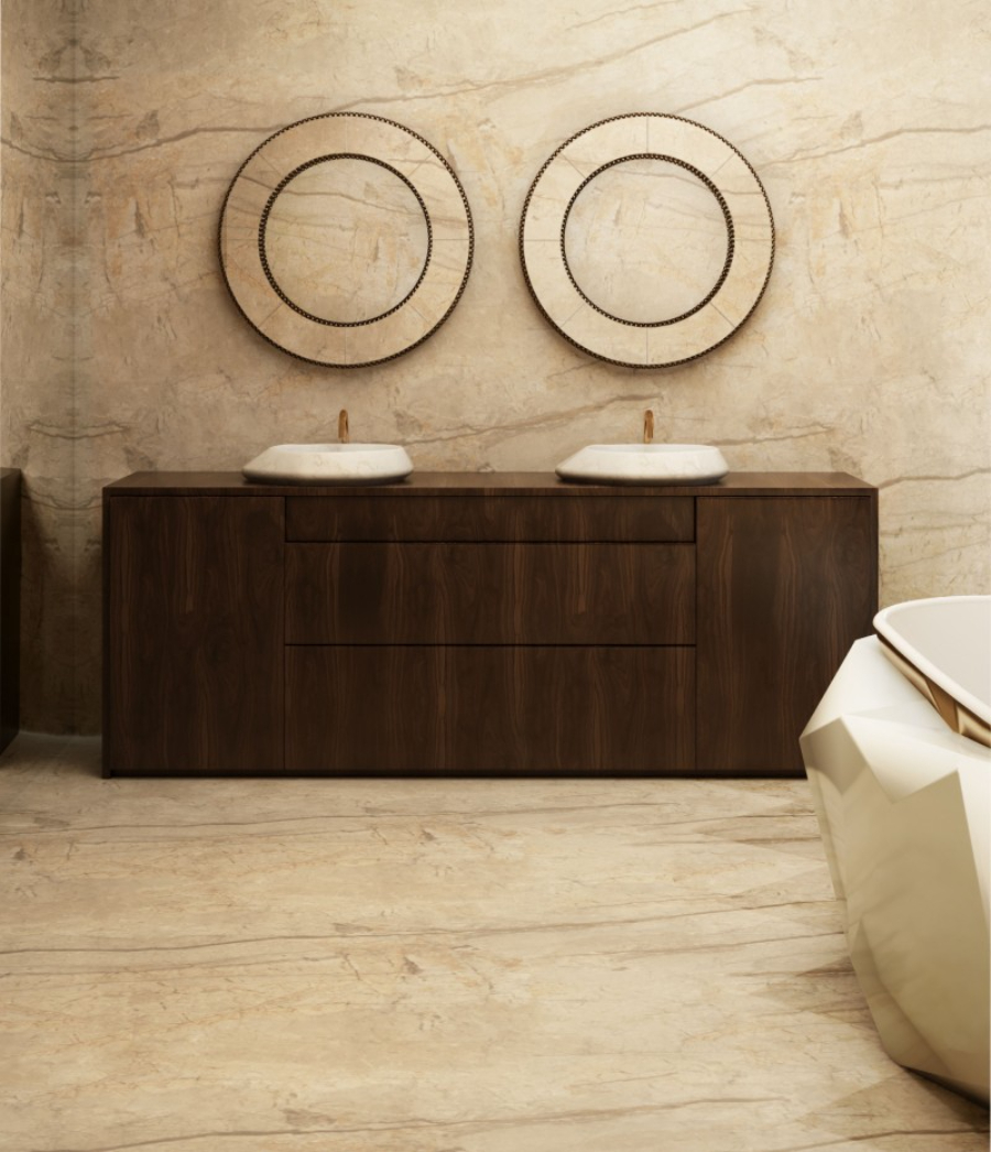 bathroom by Maison Valentina with white sinks, brown cabinets and round wall mirrors