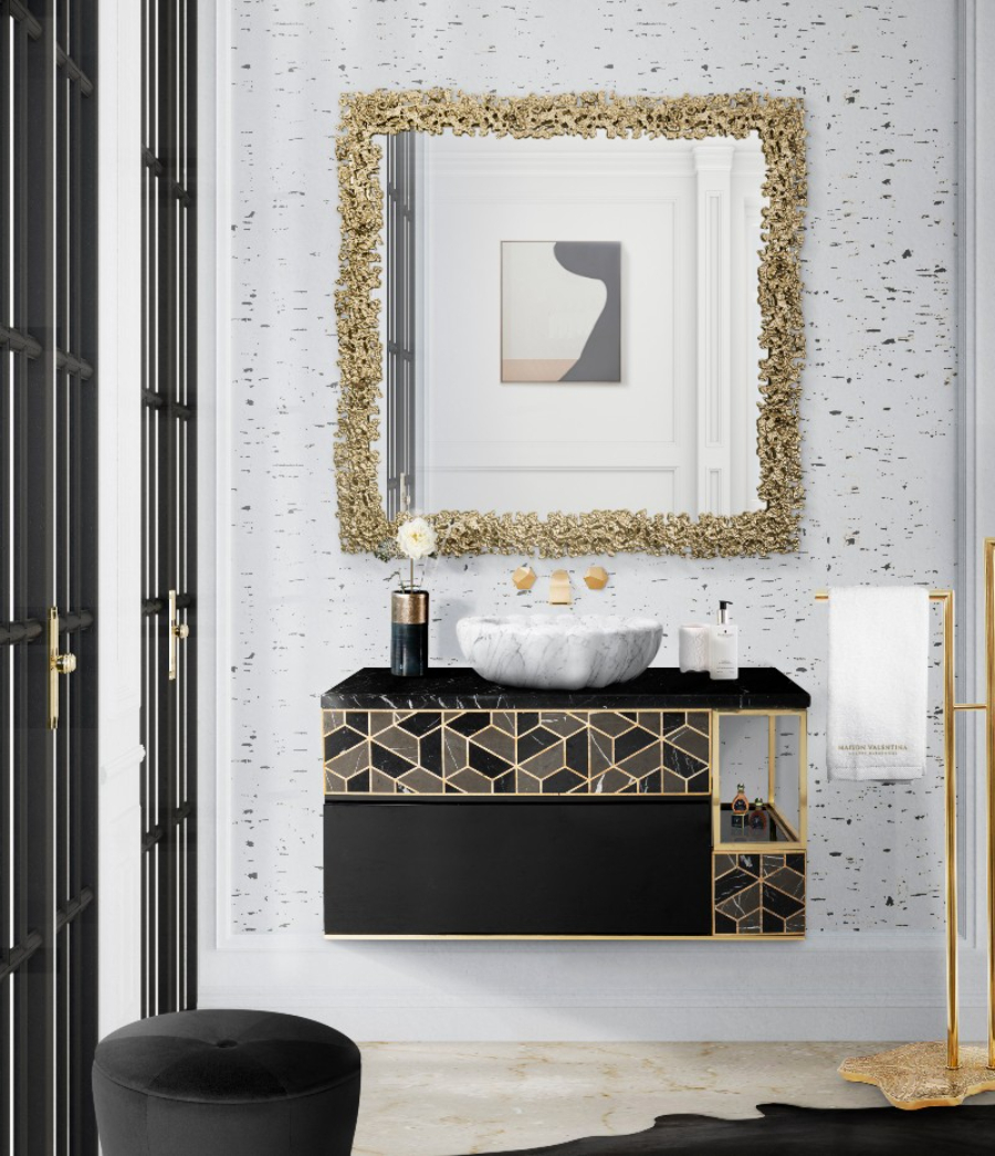 bathroom by Maison Valentina with black cabinets, white marble ink and golden mirror