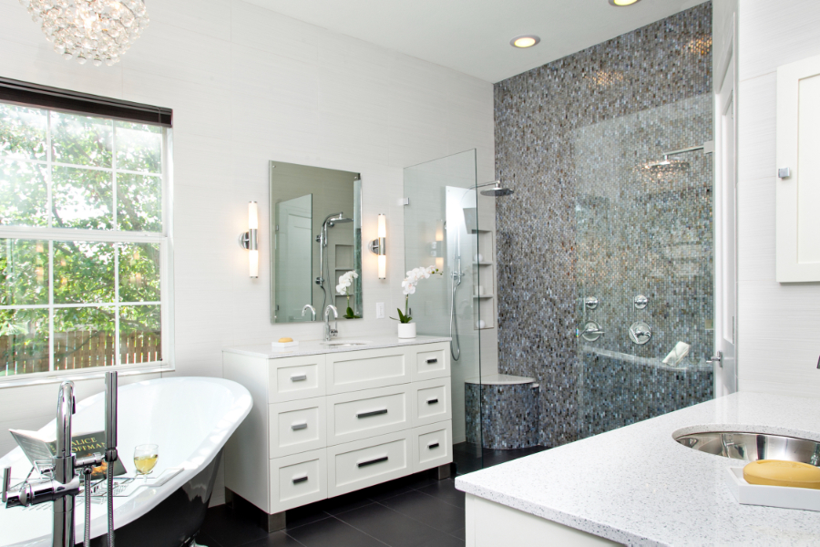 Allison Jaffe Interior Design: Bathroom Design Ideas. A bathroom with two vanities facing each other, a bathtub, and a shower for two.